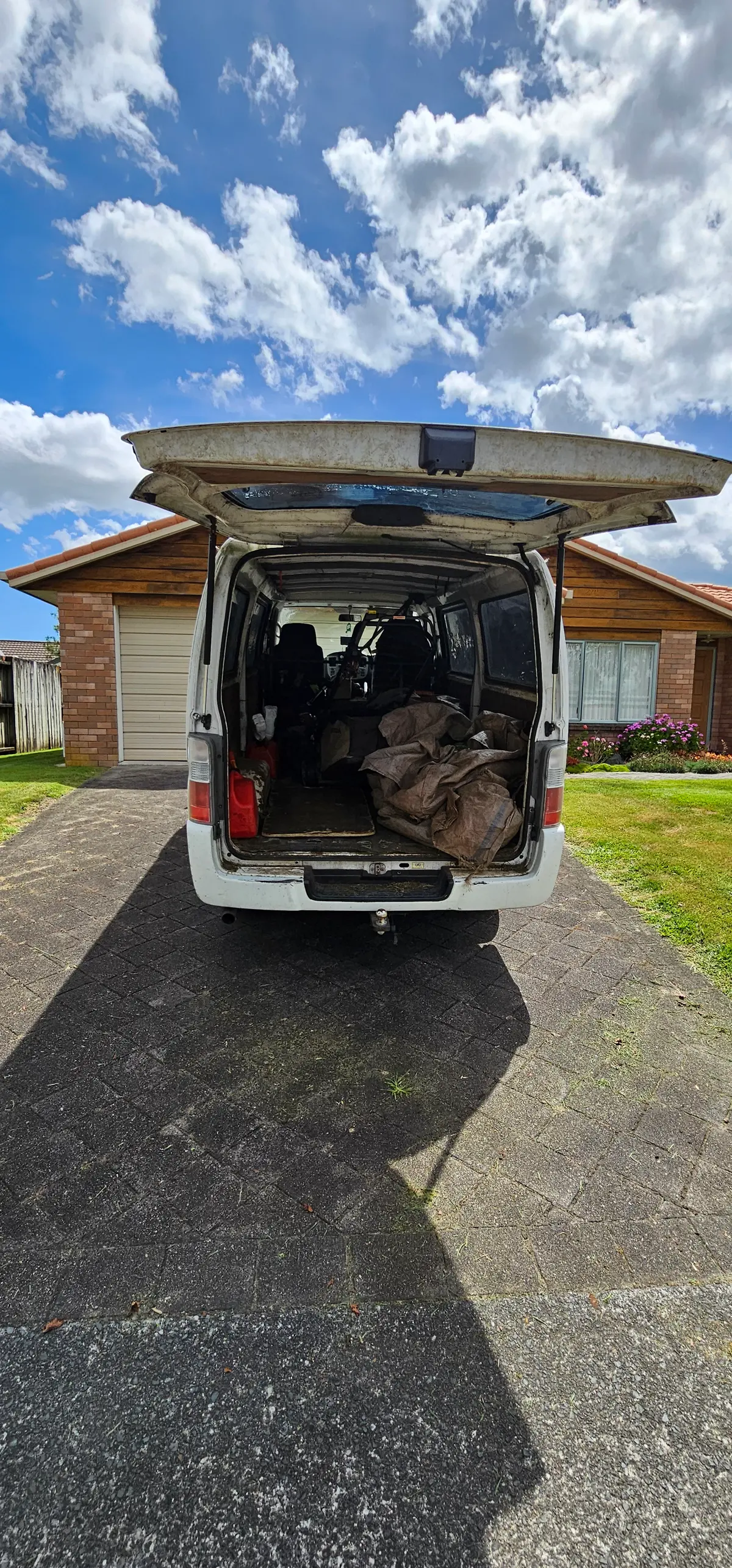 Van loaded with bags of green waste ready to go